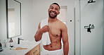 Happy man, portrait and bathroom with towel for hygiene, grooming or shower preparation in home. Male person, shirtless or beauty with smile for morning routine, dermatology or self care in house