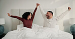 Couple, stretching and holding hands in bed with smile from sleeping, wake up and weekend break. People, happiness and positive attitude for stress relief, comfortable nap and morning routine in home