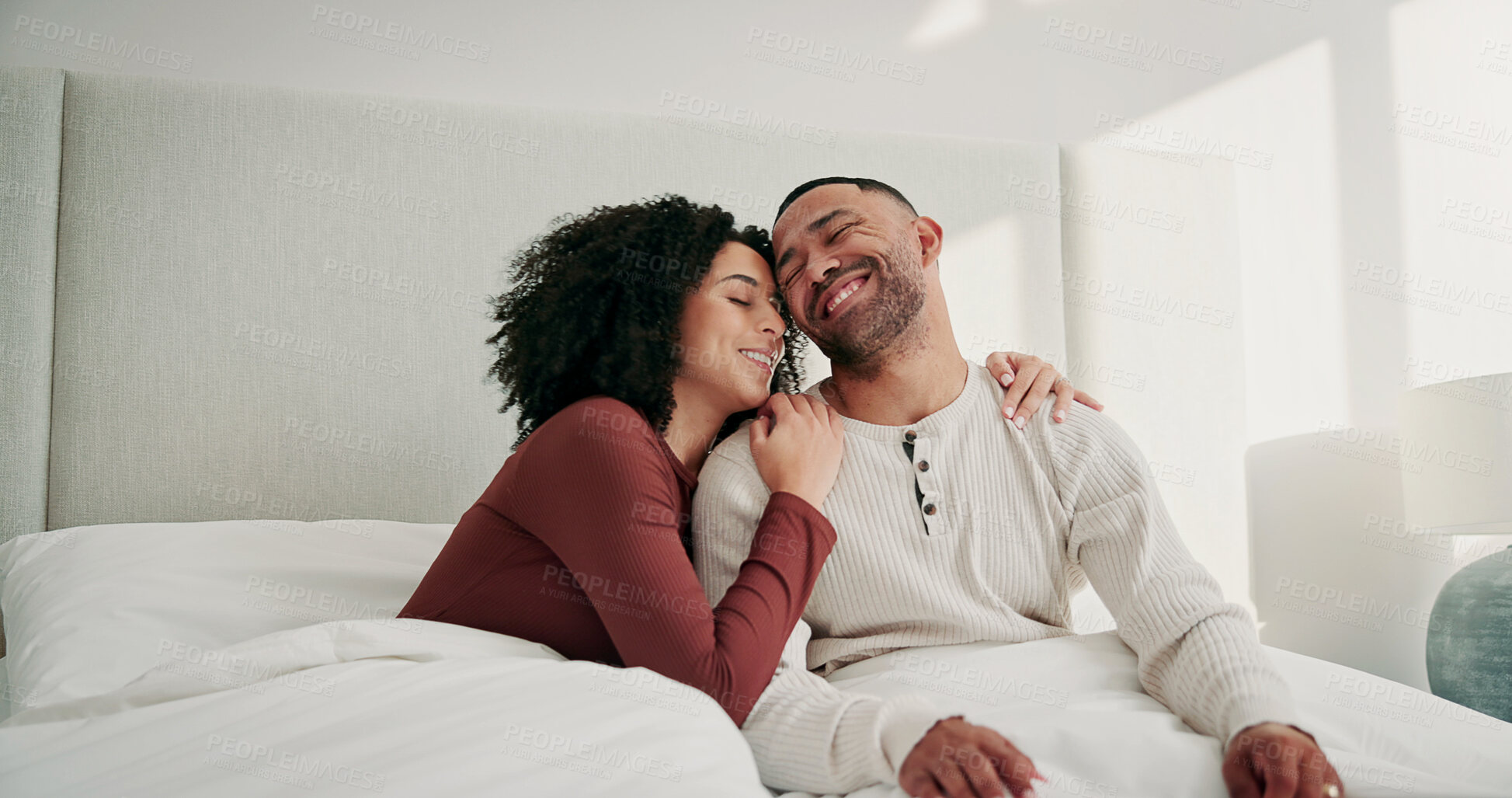 Buy stock photo Smile, couple and relax with hug in bedroom for love, cosy weekend and bonding together. Happy, people and romantic with embrace for partner affection, comfortable break and morning routine at house