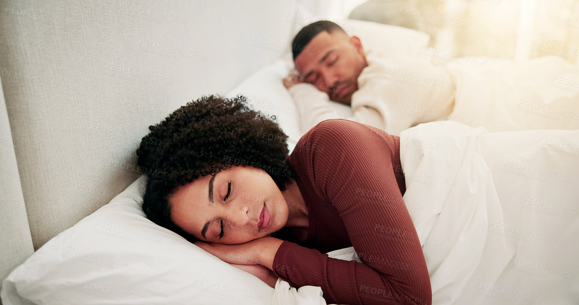 Buy stock photo Woman, couple and sleeping in bedroom with peace, exhaustion and tranquility for dreaming together. Exhausted, married people and calm in house with comfortable rest, wellness and lazy weekend break.