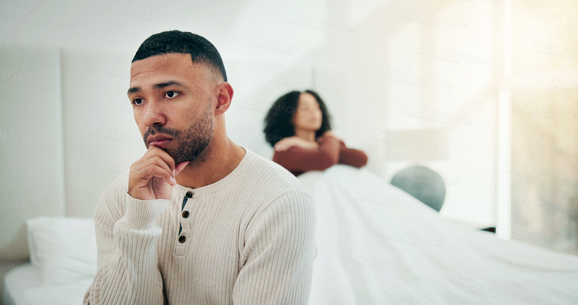 Buy stock photo Couple, fight and man with thinking on bed for disagreement, silent treatment or infidelity. Insomnia, people or contemplating marriage in home for cheating, emotional distance or unresolved conflict