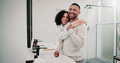 Buy stock photo Love, couple and smile with hug in bathroom for self care, getting ready together or connection. Support, happy people or embrace in portrait for grooming routine, morning hygiene and bonding in home