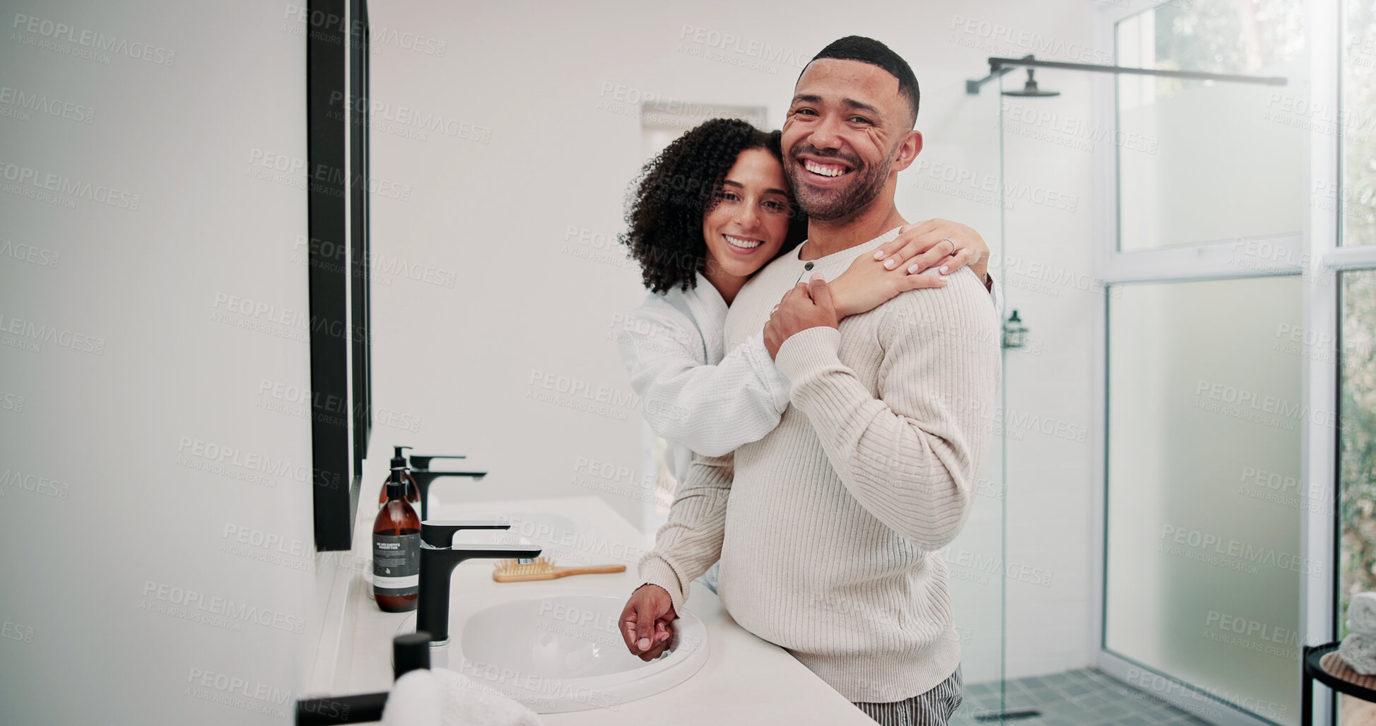 Buy stock photo Love, couple and smile with hug in bathroom for self care, getting ready together or connection. Support, happy people or embrace in portrait for grooming routine, morning hygiene and bonding in home