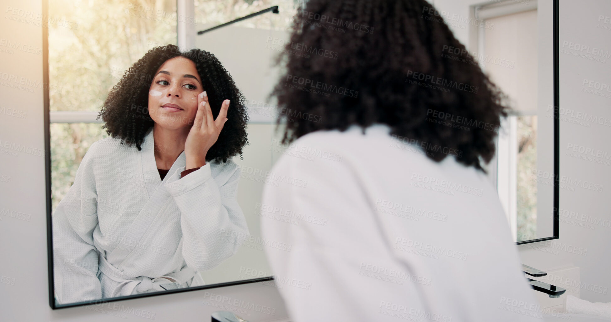 Buy stock photo Happy woman, grooming or skincare with lotion in mirror for hygiene or anti aging treatment in home. Female person, face cream or moisturizer with reflection for spa day or morning routine in house