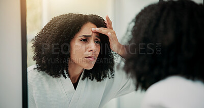 Buy stock photo Woman, concern and check face in mirror with skincare, inspection or fear for acne breakout in bathroom. Female person, skin evaluation and dermatology in house with reflection, worry or pimple issue