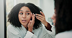 Woman, skincare and check face in mirror with inspection, beauty and search for pimples in bathroom. Female person, acne evaluation and dermatology in house with reflection, self care and grooming.