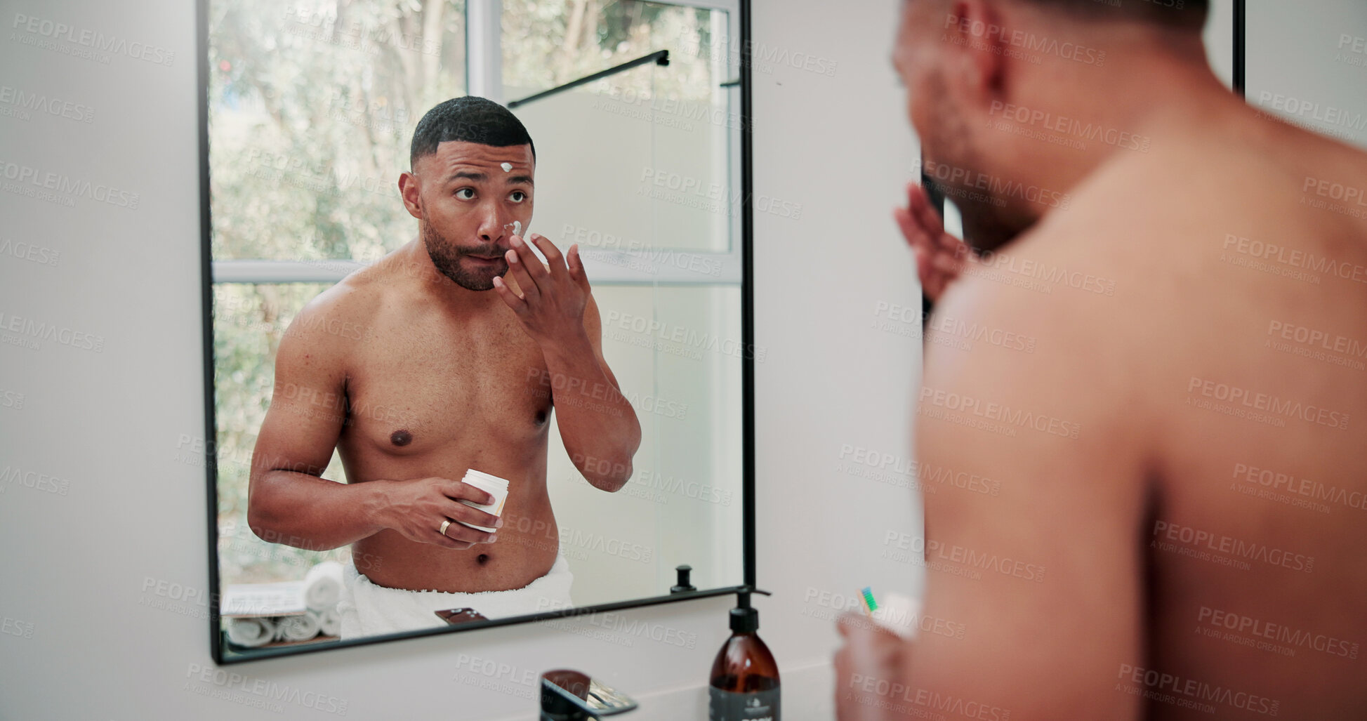 Buy stock photo Man, skincare and mirror with face cream for hygiene, facial or anti aging treatment in home. Male person, lotion or moisturizer with reflection for beauty cosmetics or morning routine in house