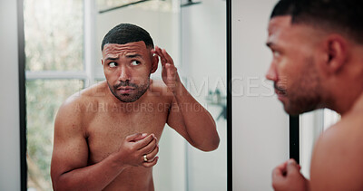 Buy stock photo Man, mirror and skincare with acne in bathroom for hygiene, dermatology or pimple in home. Male person, stress and skin breakout with reflection or anxiety for beauty, bacteria or pore in house