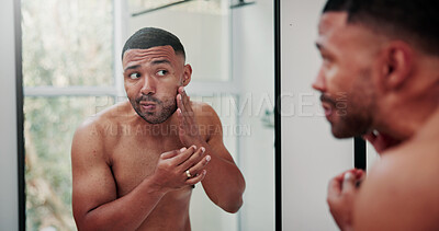Buy stock photo Man, mirror and skincare with breakout in bathroom for hygiene, dermatology or pimple in home. Male person, stress and skin acne with reflection or anxiety for beauty, bacteria or pore in house