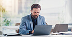 Businessman, accounting and office with laptop for finance, budget planning or corporate tax audit. Man, accountant or research with computer for financial expenses, company bills or revenue service