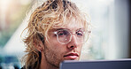 Laptop, reading and business man with glasses in office for social media marketing or online post. Computer, marketer and person in workplace for engagement info, ads schedule or research review