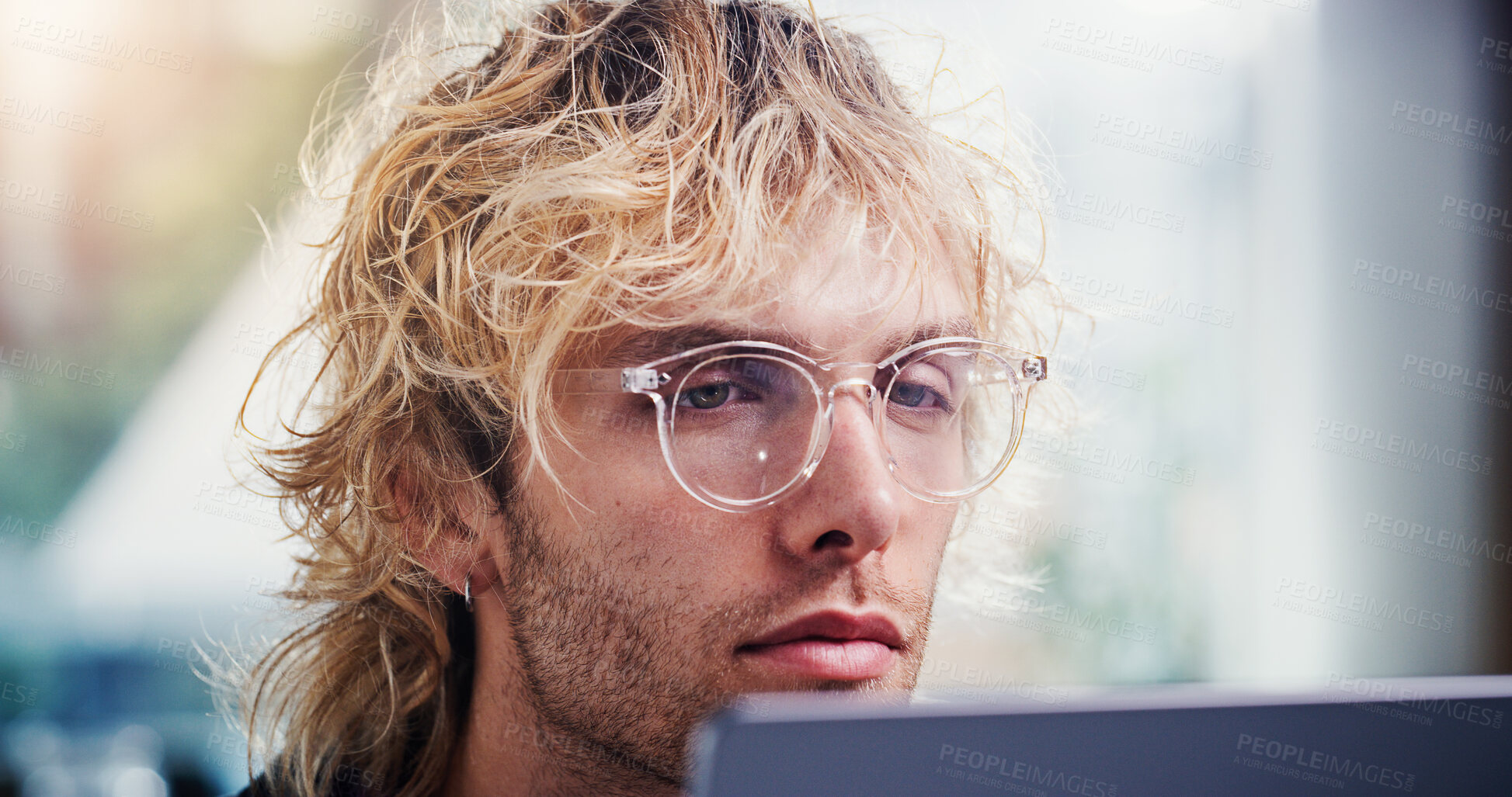 Buy stock photo Laptop, reading and business man with glasses in office for social media marketing or online post. Computer, marketer and person in workplace for engagement info, ads schedule or research review