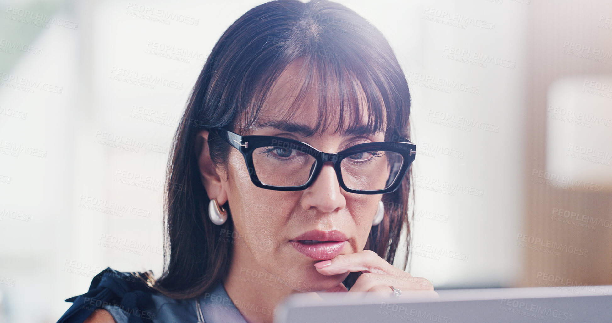 Buy stock photo Businesswoman, thinking or reading in office with laptop, review press release or brand management. Mature person, plan or problem solving in agency with computer, glasses or online public relations.