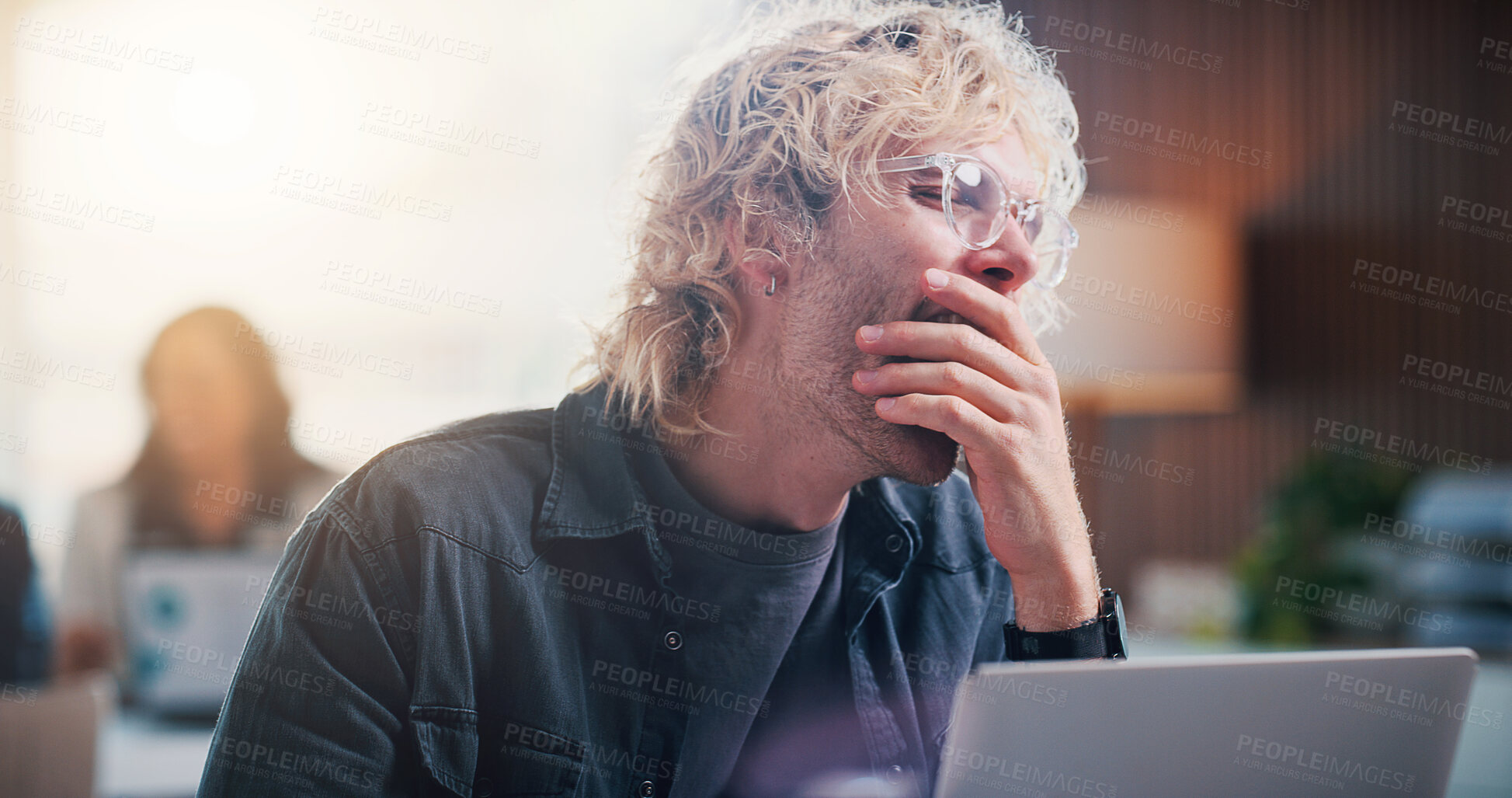 Buy stock photo Tired, man and yawning with laptop in office for fatigue, exhausted or overworked strain. Burnout, person and employee with computer for project deadline, boredom or unproductive day in workplace