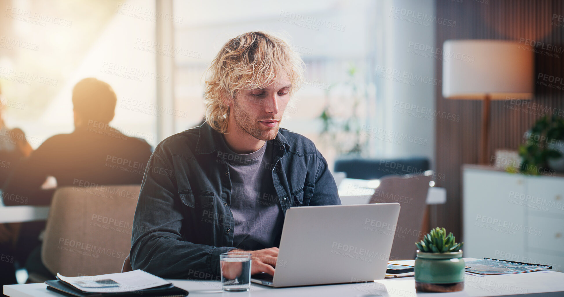Buy stock photo Businessman, typing and creative with laptop in office, copywriting or blog post on social media app. Business, copywriter and person with tech for article, serious and email marketing on website