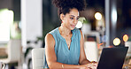 Night, woman and typing in office with laptop, research or draft newsletter for email marketing project. Late, bokeh or person in business with computer, planning or schedule campaign for advertising