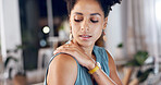 Night, woman and fatigue in office with shoulder pain, bad posture or deadline for marketing project. Late, bokeh and person in business with muscle strain, problem or pressure for advertising agency