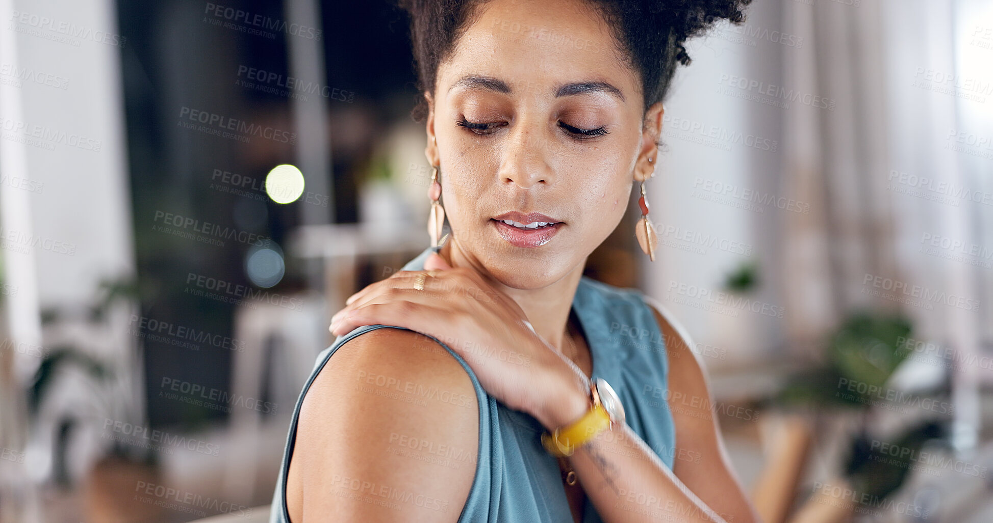 Buy stock photo Night, woman and fatigue in office with shoulder pain, bad posture or deadline for marketing project. Late, bokeh and person in business with muscle strain, problem or pressure for advertising agency