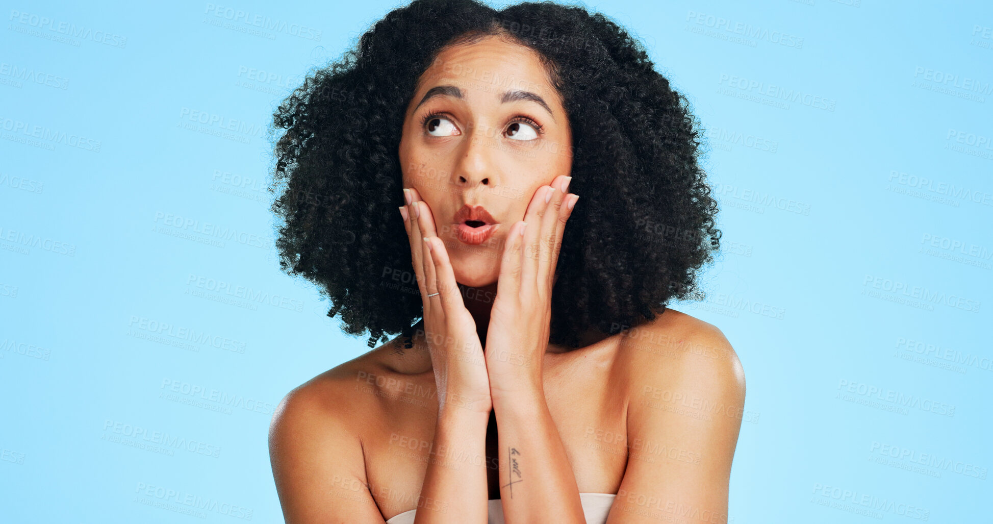 Buy stock photo Thinking, beauty and woman in studio with funny face for makeover, cosmetics and spa options. Cosmetology, space and person with decision for grooming, makeup and salon treatment on blue background