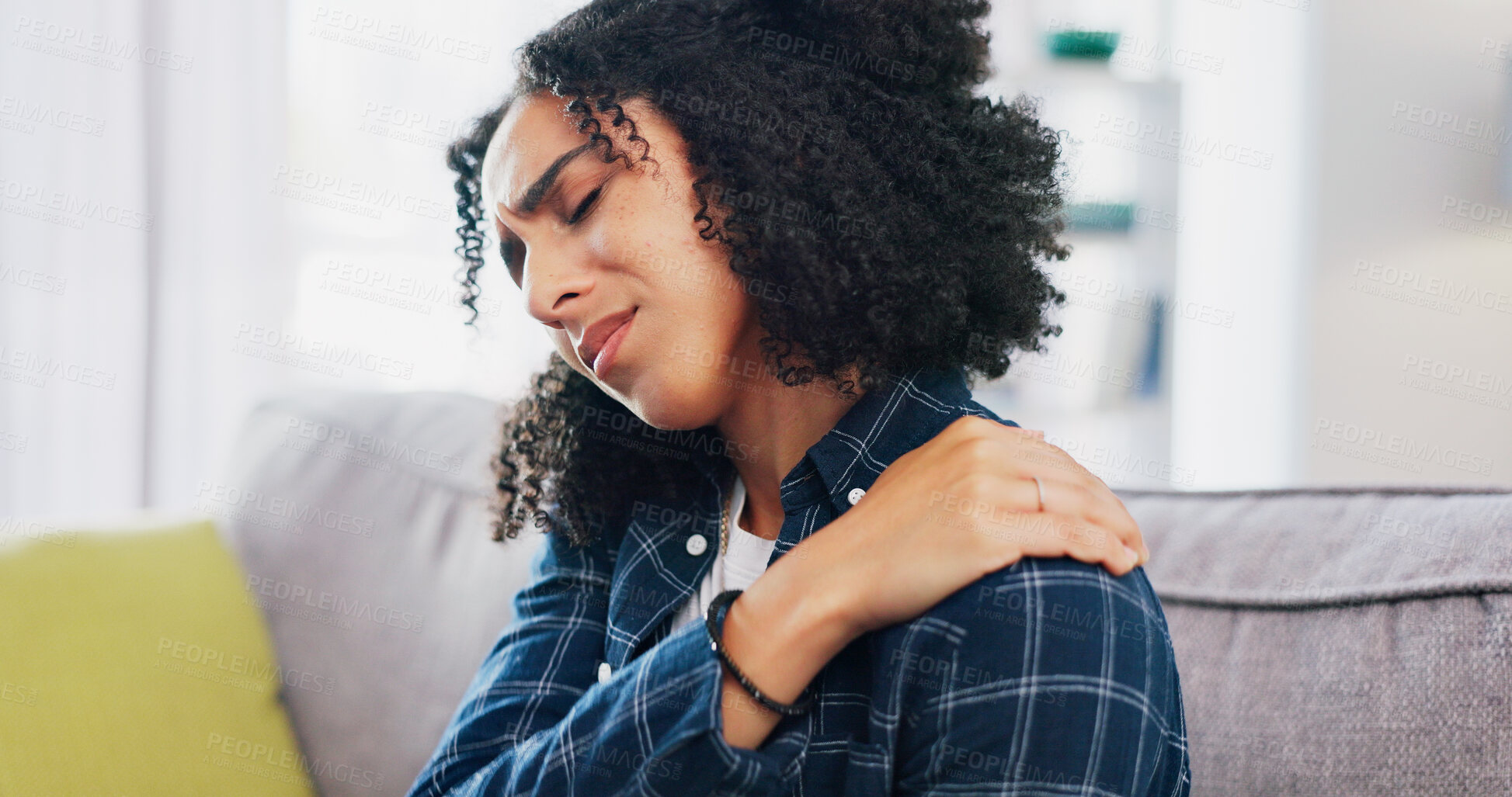 Buy stock photo Woman, stress and sofa with shoulder pain for pressure, bad posture or mental health in home. Frustrated, joint inflammation or female person with depression or strain for muscle tension in house