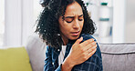 Woman, stress and sofa with shoulder pain for injury, bad posture or mental health in home. Frustrated, joint inflammation or female person with depression or pressure for muscle tension in house
