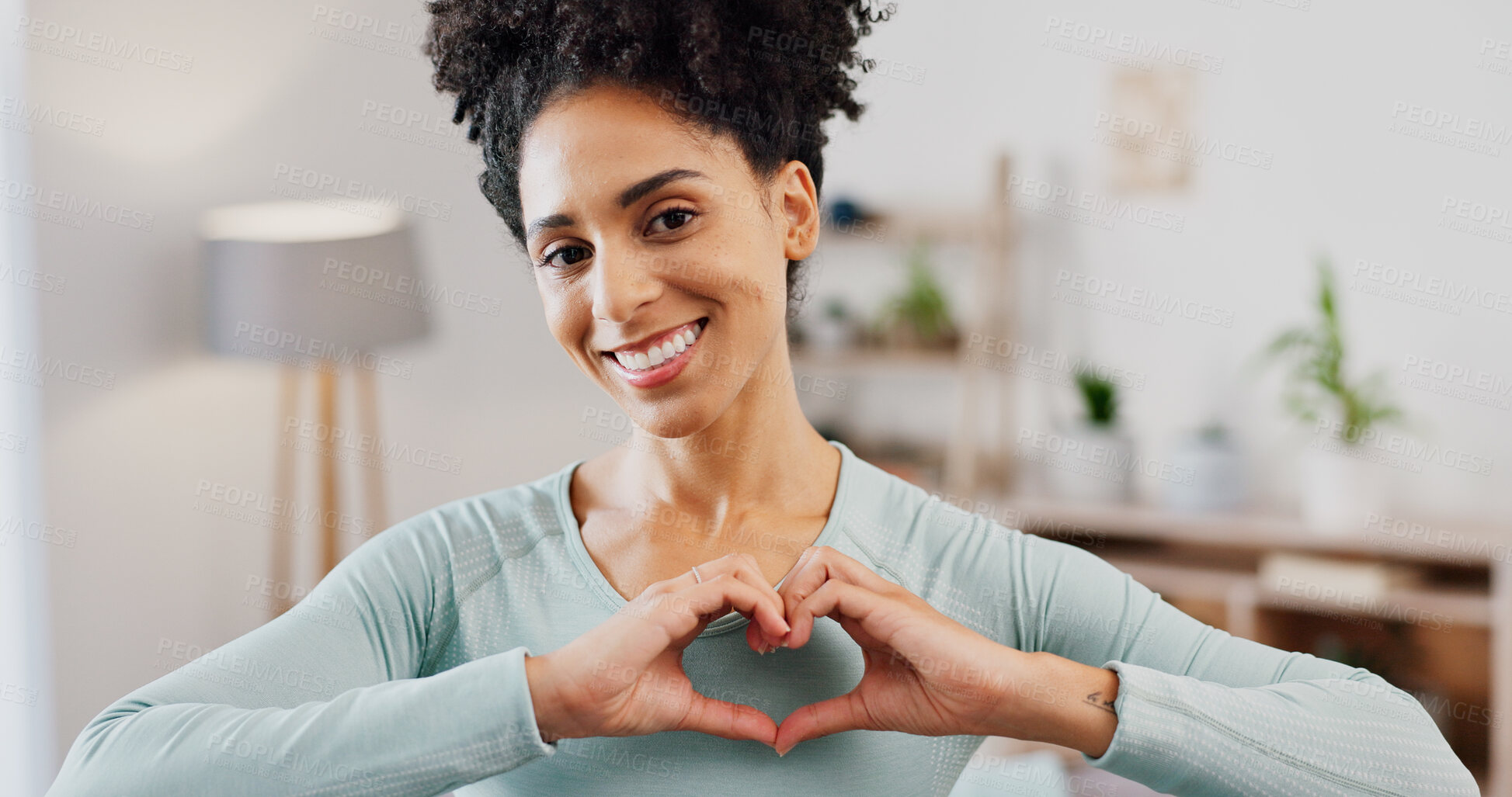 Buy stock photo Heart hands, portrait and smile of woman in home for health, reaction or wellness promotion. Emoji, love and satisfaction with happy person in living room of apartment for affection or support