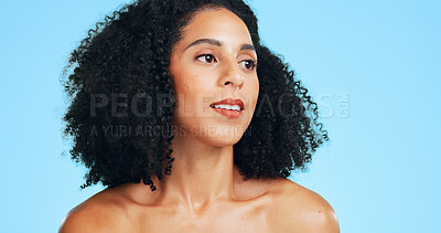 Buy stock photo Thinking, skincare and woman in studio for beauty, natural glow and wellness on blue background. Cosmetic idea, reflection and person with aesthetic, hairstyle and self care with healthy skin