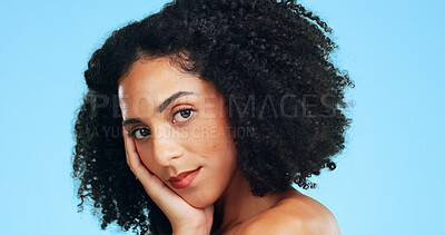 Buy stock photo Portrait, skincare and woman in studio with shine, dermatology and wellness on blue background. Cosmetic, confidence or person with facial glow for natural beauty, aesthetic or touch for smooth skin