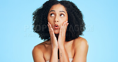 Buy stock photo Thinking, skincare and woman in studio with surprise, natural glow or wellness on blue background. Cosmetic idea, dermatology or person with shock for beauty, aesthetic or results with healthy skin
