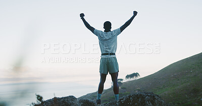 Buy stock photo Hike, back and man on cliff with arms up, cardio goal or celebration in fitness goals. Space, success or person on mountain peak with victory, achievement and milestone reach in outdoor trekking.