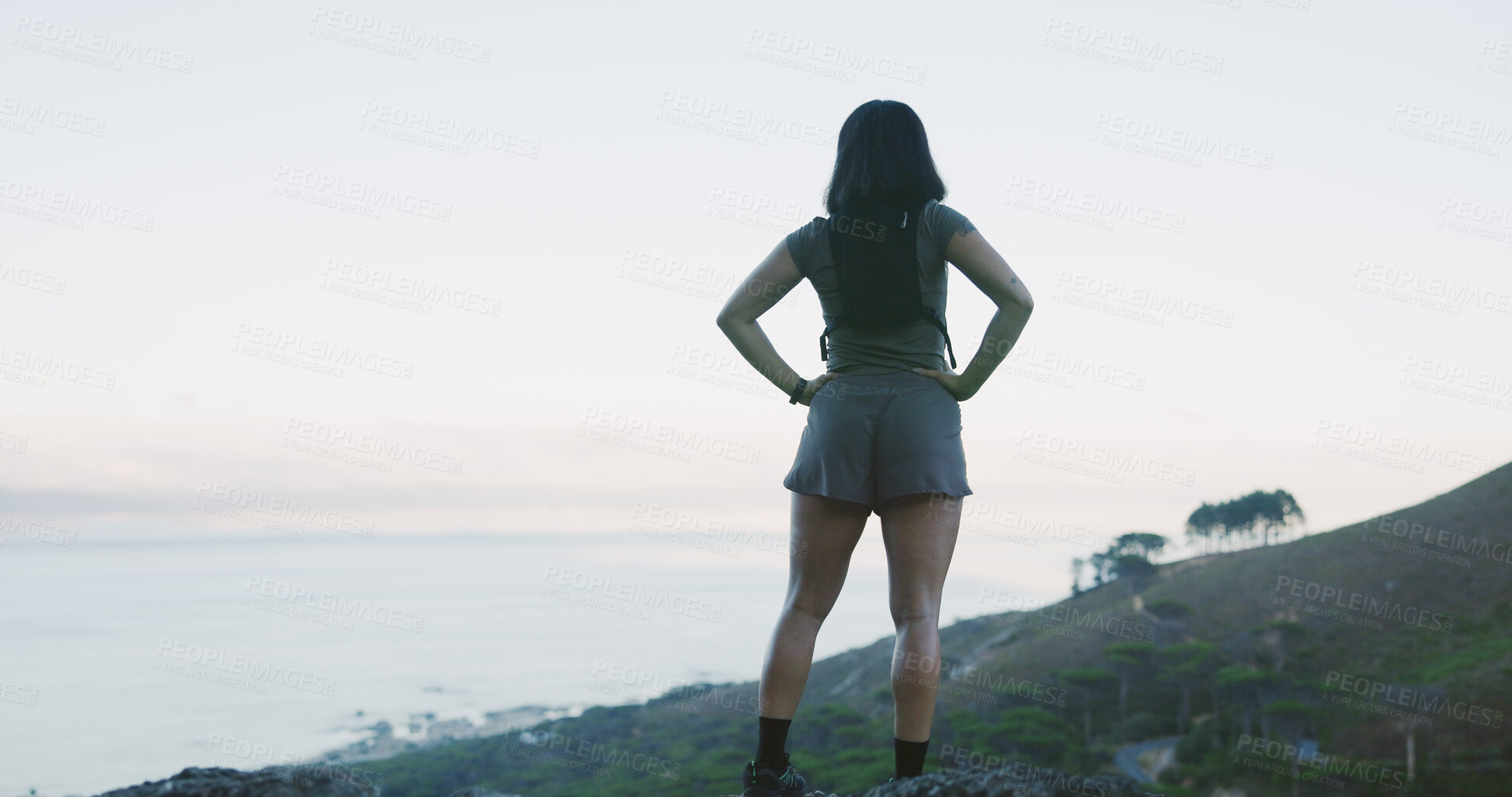 Buy stock photo Hiking, back and woman with view of mountain for fitness break, nature appreciation and space. Health, person and trekking destination on hill with sightseeing, ocean scenery and explore for wellness
