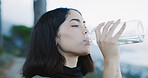 Woman, fitness or drinking with water in nature for outdoor workout break, rest or recovery. Active, female person or hiker with mineral liquid, bottle or beverage for exercise, hydration or vitamins