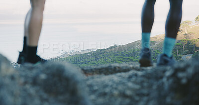 Buy stock photo People, legs and hiking on mountain rock for outdoor adventure, journey or fitness exercise. Friends, hiker or tourist with shoes or view on cliff for workout, trekking trail or walk in wilderness