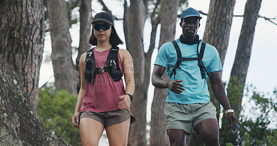 Buy stock photo Fitness, hiking or couple in nature with walk, partnership or support in physical activity. Team, cardio or interracial people with exercise, workout together or outdoor trekking in active hobby.