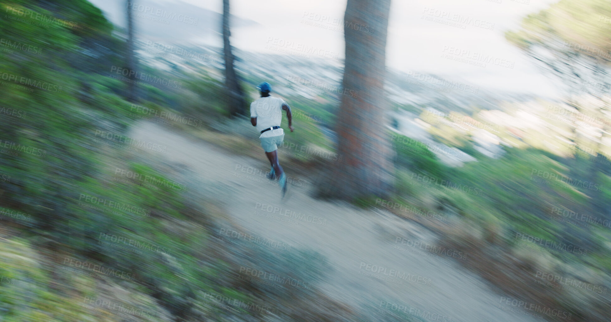 Buy stock photo Fitness, black man and running in forest with motion blur, body health and cardio endurance workout. Person, back and fast runner in woods for exercise, speed or high intensity interval training