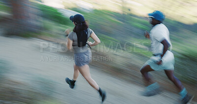 Buy stock photo Speed, running and couple with motion blur outdoor for fitness, cardio wellness or race. Sport, marathon practice or people on runner path in forest for health, exercise or workout together 