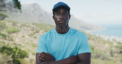 Buy stock photo Outdoor, portrait and black man with arms crossed for fitness, travel and hiking hobby for exercise. Serious, nature and person with pride for trekking adventure, explore mountain and aerobic workout