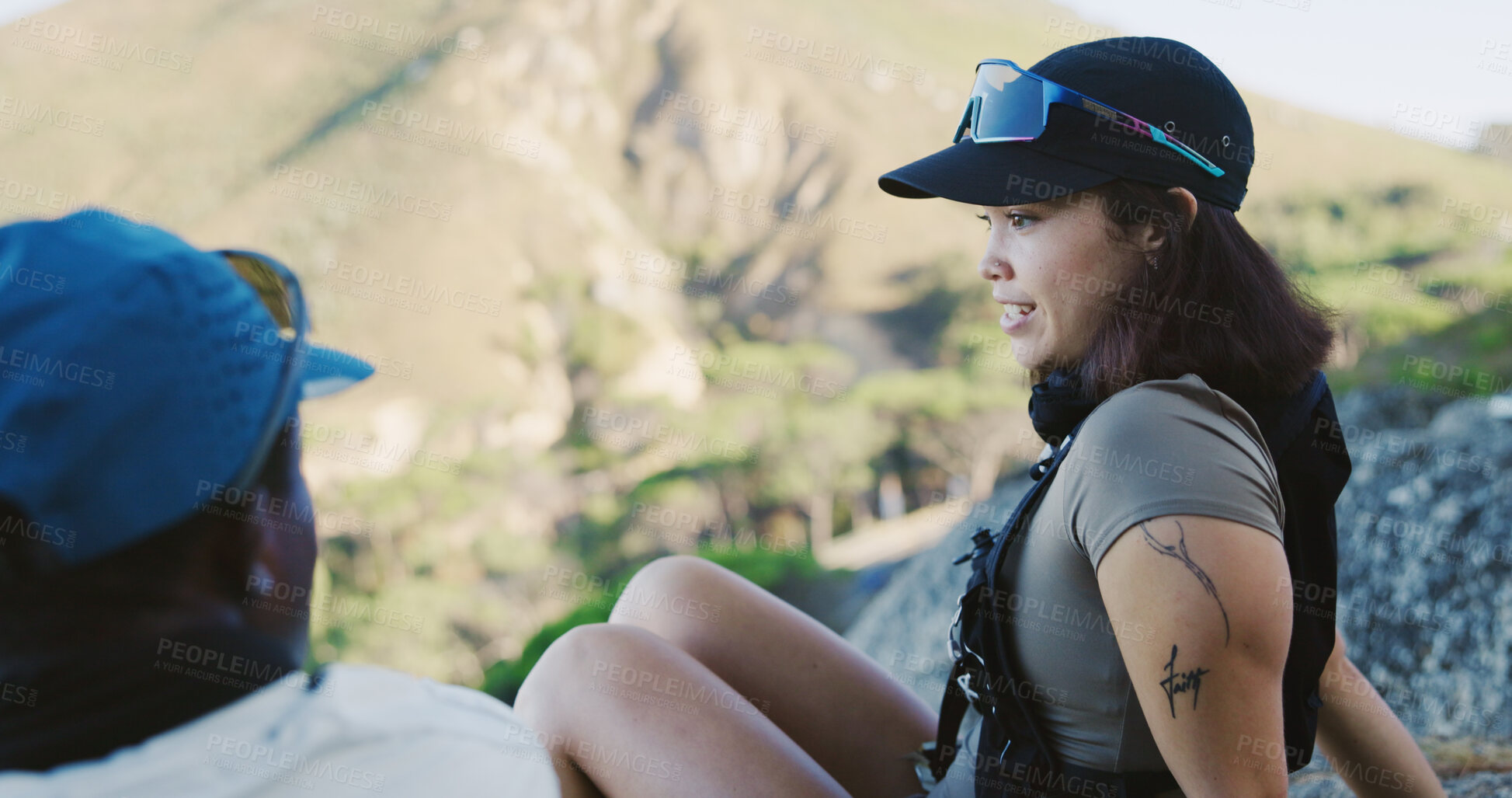 Buy stock photo Outdoor, couple or woman with break for travel, hiking adventure discussion or tourism for holiday. Relax, talking and people with trekking trip for vacation, interracial and sightseeing in nature