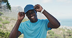 Portrait, outdoor or black man with hat for fitness, confidence or hiking hobby for summer exercise. Smile, pride and person with gear for trekking adventure, mountain exploration and aerobic workout