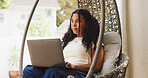 Patio, education and woman with laptop, thinking and planning for assignment on swing and elearning. Outdoor, student and person with technology for exam preparation, serious and reflection at house