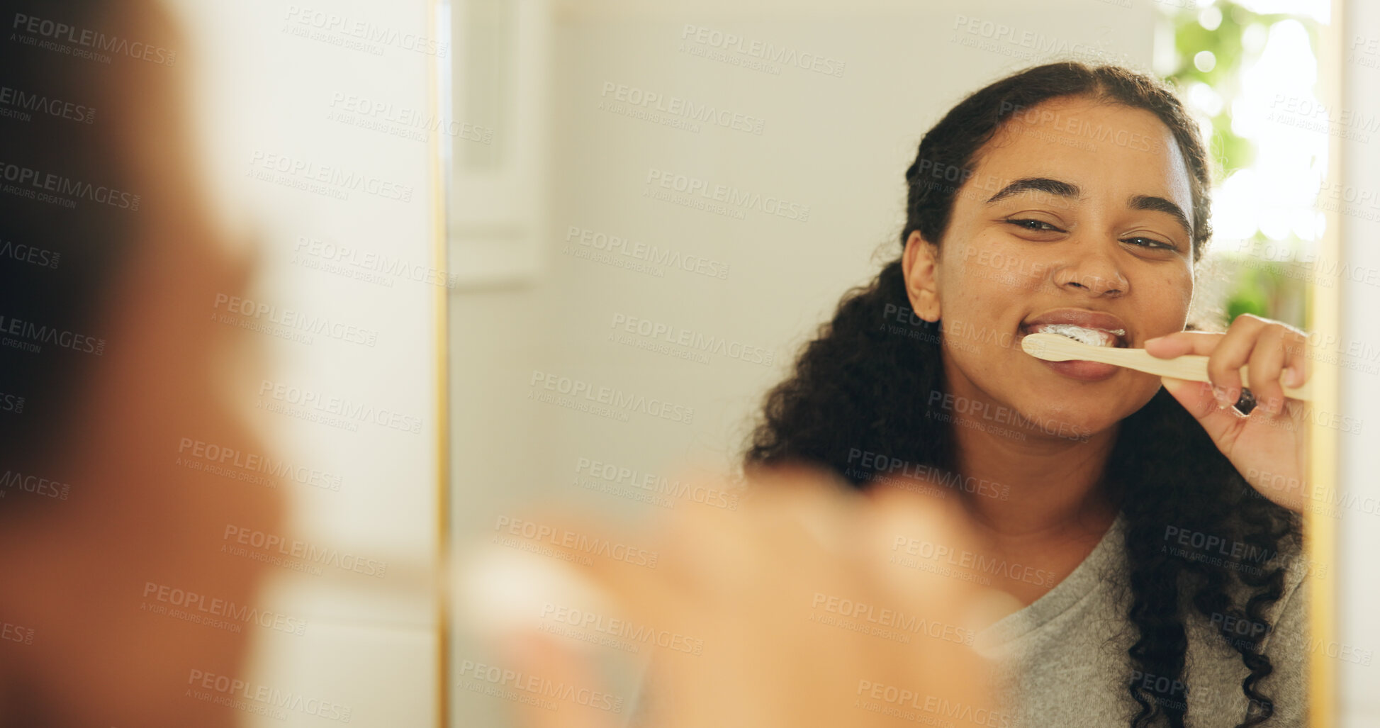Buy stock photo Mirror, smile and woman in bathroom for brushing teeth, oral wellness and self care in home. Dental hygiene, bamboo toothbrush and happy person with reflection, toothpaste or cleaning for gum health