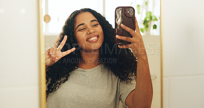 Buy stock photo Woman, peace sign and selfie in mirror with smile for social media post, memory or online update in home. Happiness, hand gesture and app for profile picture with reflection of person at house