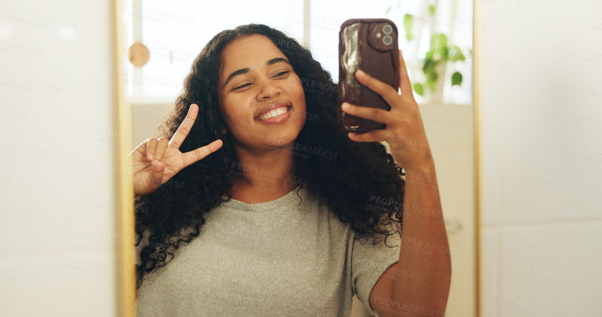 Buy stock photo Woman, peace sign and selfie in mirror with smile for social media post, memory or online update in home. Happiness, hand gesture and app for profile picture with reflection of person at house