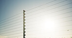 Outdoor, safety and electrical fence with security, high voltage circuit and boundary for protection. Wire, barrier and system with powerline for prohibited entry, crime defense and access control.