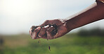 Farmer, hand and check soil with inspection for healthy crops, quality assurance or sustainability. Space, person and compost evaluation on farm outdoor for agriculture, fertilizer nutrients or dirt.