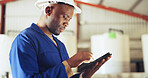 Engineer, man and inspection with tablet, serious and checking water system in industrial warehouse. Inspector, online and black person with tech for quality control, maintenance and leak detection