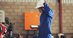 Black man, tablet and thinking with hard hat in factory for system repair, fix or maintenance. Male person, engineer or technician contemplating with technology for quality check or troubleshooting