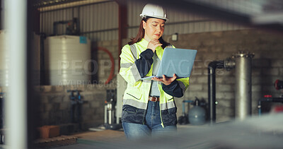 Buy stock photo Engineer, woman and inspection with laptop, serious or checking water system in industrial warehouse. Inspector, online and person with tech for quality control, maintenance and leak detection on web