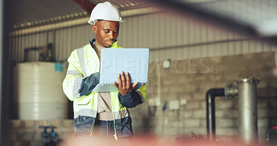 Buy stock photo Engineer, laptop and black man in warehouse for hydraulic system, inspection and tank maintenance. Technician, water plant and person on computer for research, quality assurance and online checklist