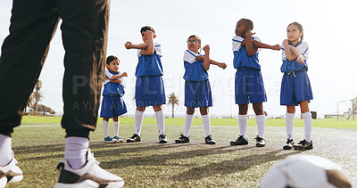 Buy stock photo Coach, kids and stretching on field for soccer, practice and help getting ready for sport game. Trainer, legs and children training for football match with warm up, exercise and athlete group outdoor